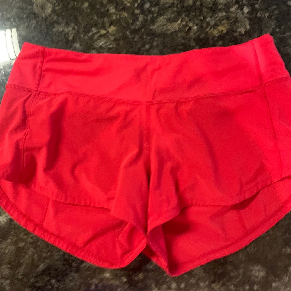 Red Lululemon shorts